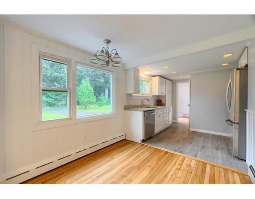 218 Ellis Road Westminster, MA 01473 - Photo 10 of 30 a view of a kitchen with a sink wooden floor and a kitchen