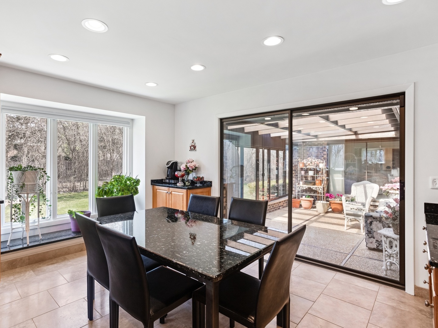 470 East Westleigh Road Lake Forest, IL 60045 - Photo 11 of 28 a dining room with furniture large windows and a chandelier