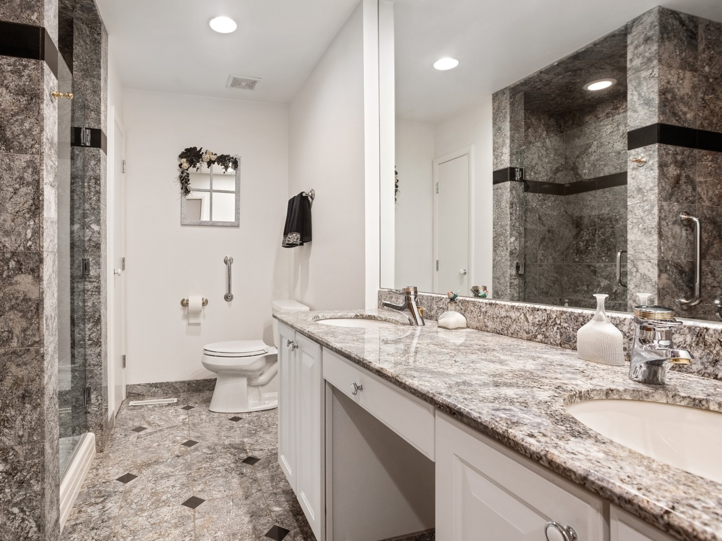 470 East Westleigh Road Lake Forest, IL 60045 - Photo 15 of 28 a bathroom with a granite countertop sink a toilet and a shower