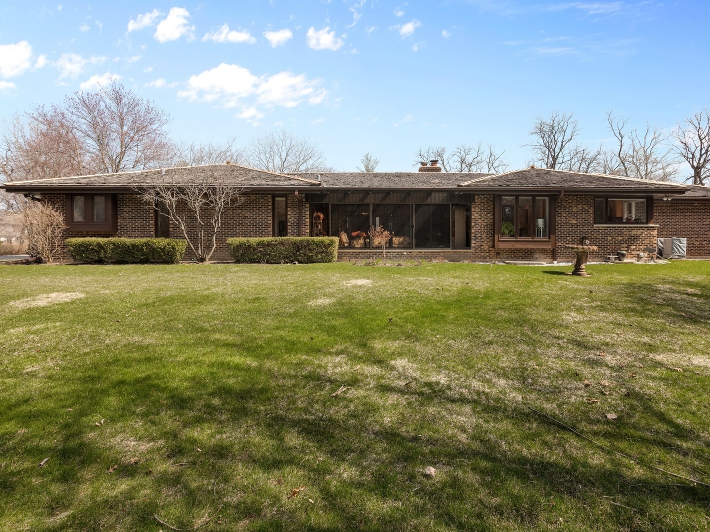 470 East Westleigh Road Lake Forest, IL 60045 - Photo 27 of 28 a view of a house with backyard and sitting area