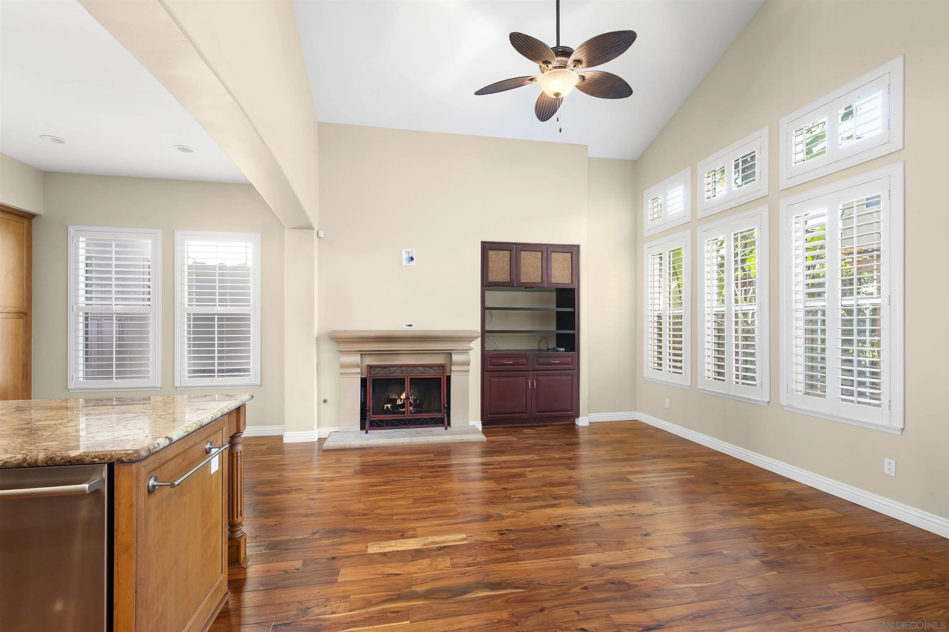 2873 West Bainbridge Road San Diego, CA 92106 - Photo 17 of 54 a living room with furniture and a fireplace