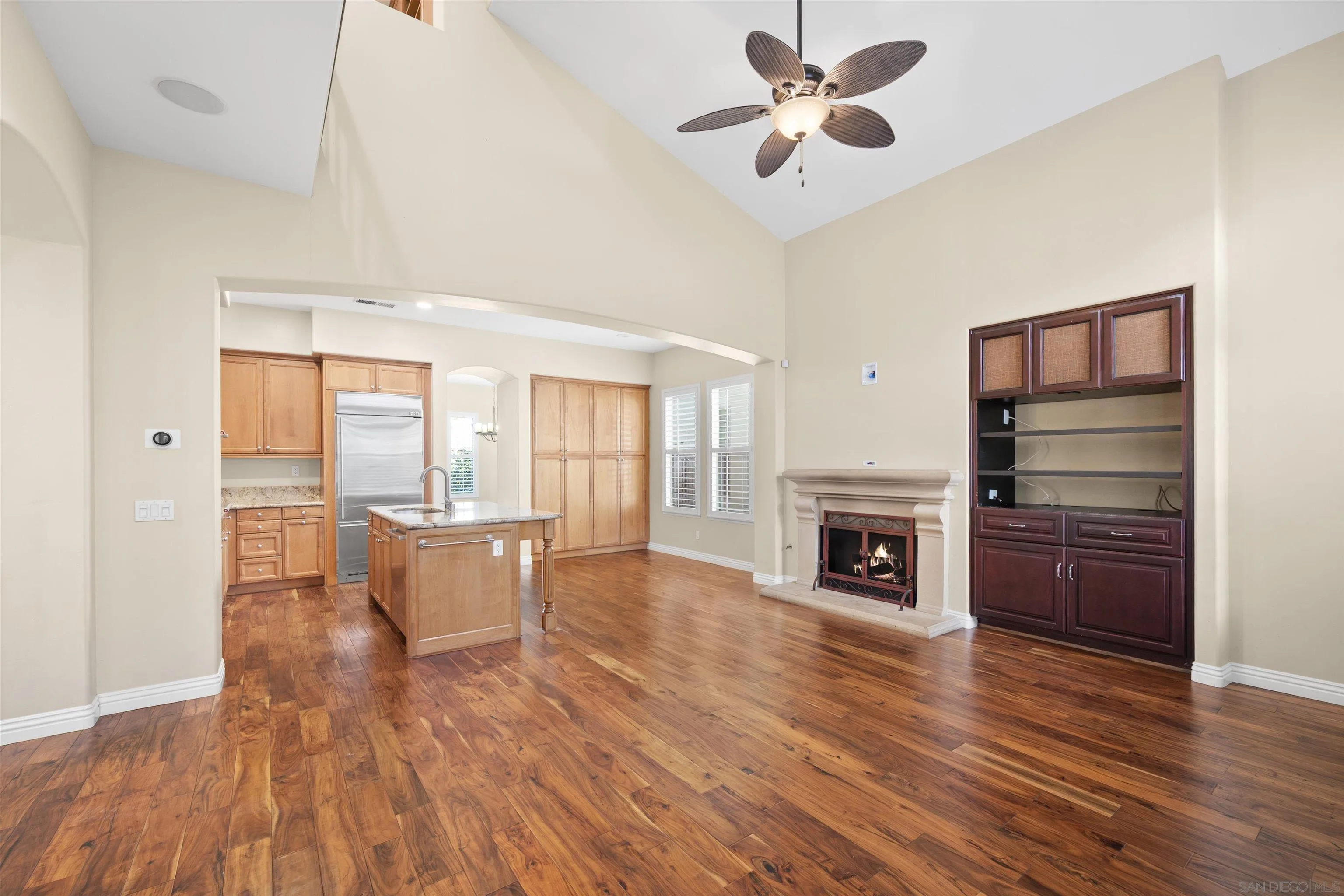 2873 West Bainbridge Road San Diego, CA 92106 - Photo 18 of 54 a view of kitchen with livingroom and fireplace