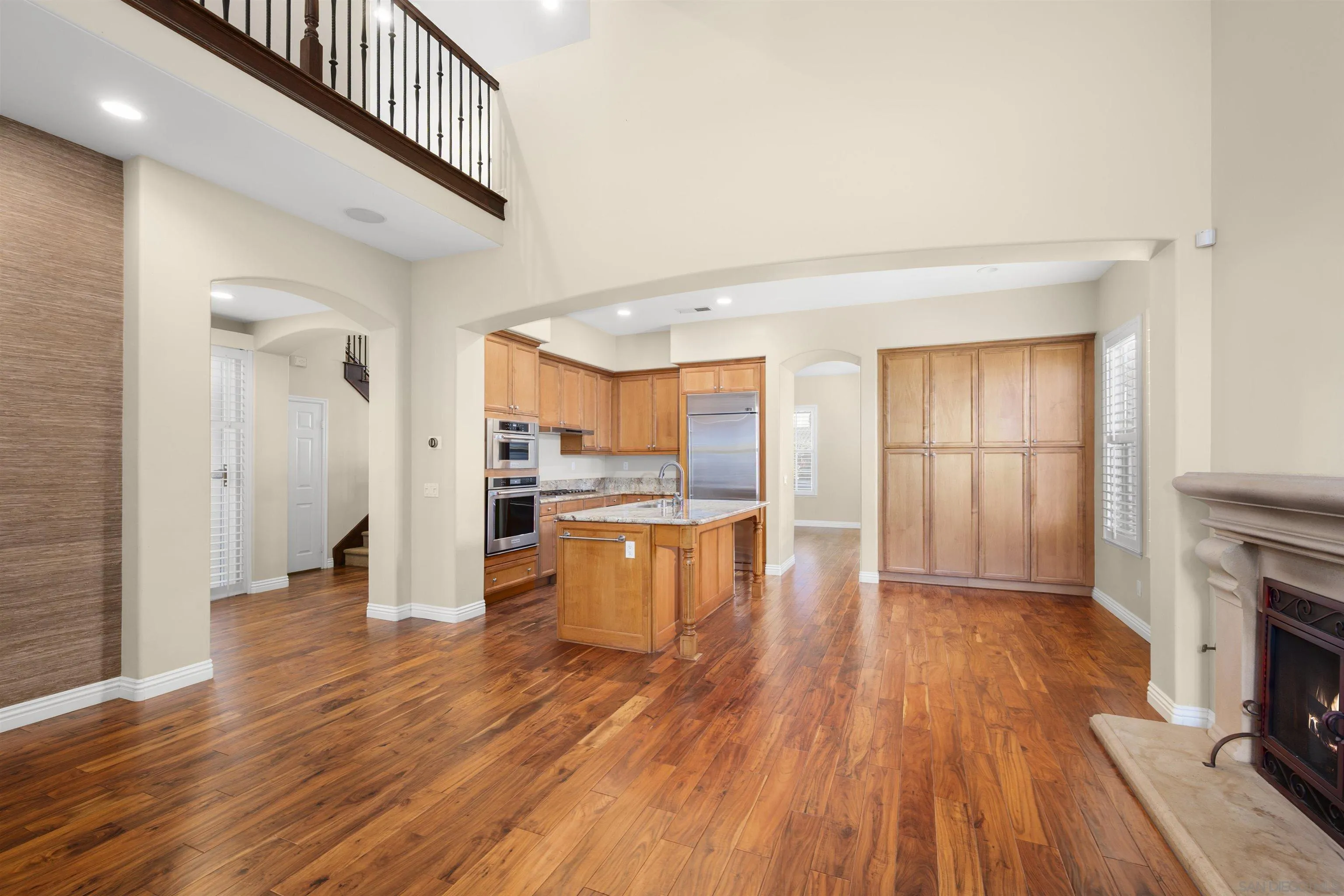 2873 West Bainbridge Road San Diego, CA 92106 - Photo 19 of 54 a view of kitchen with furniture and wooden floor