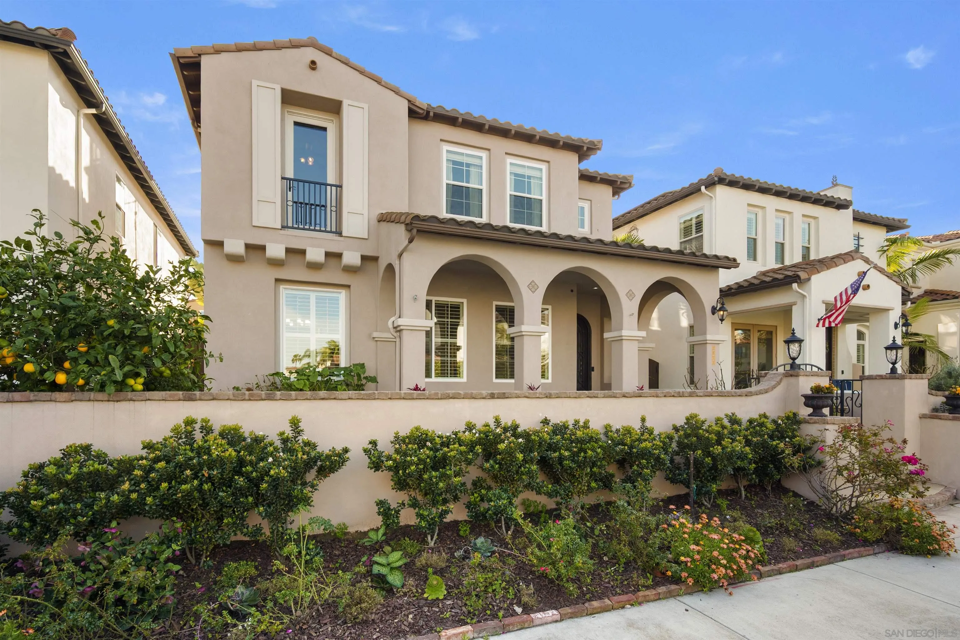 2873 West Bainbridge Road San Diego, CA 92106 - Photo 2 of 54 a front view of a house with a yard