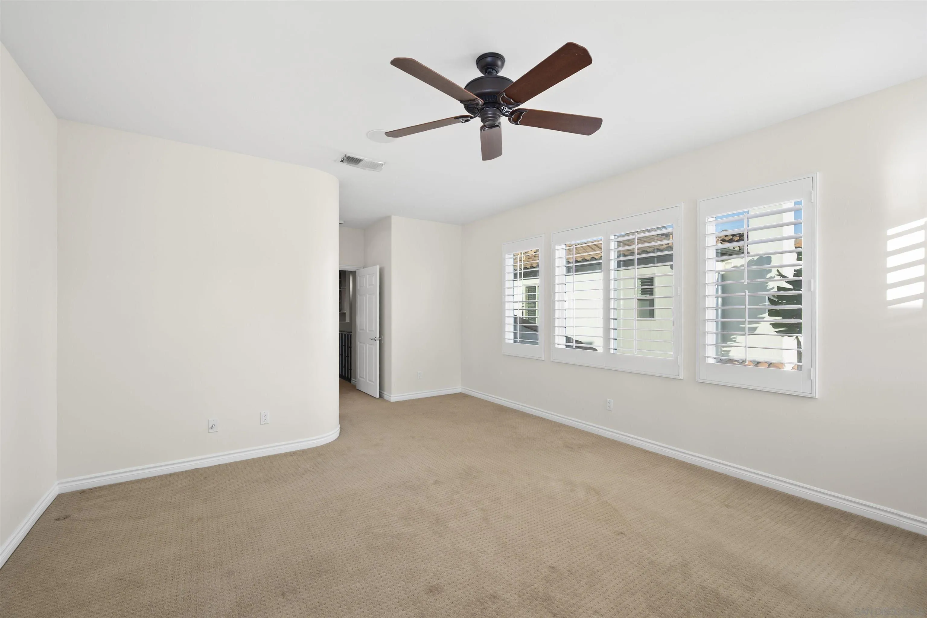 2873 West Bainbridge Road San Diego, CA 92106 - Photo 29 of 54 a view of an empty room with a window