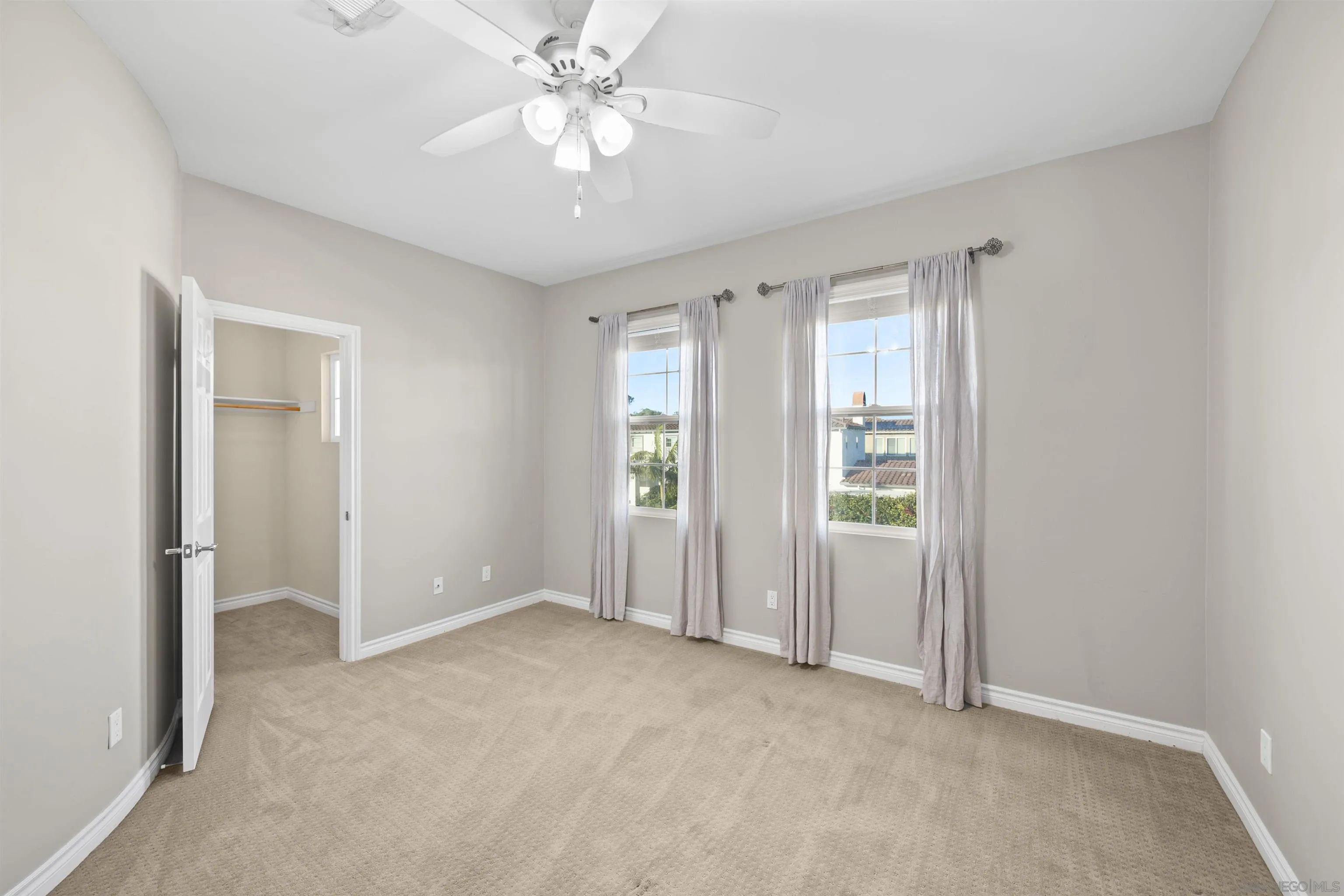 2873 West Bainbridge Road San Diego, CA 92106 - Photo 34 of 54 an empty room with chandelier fan