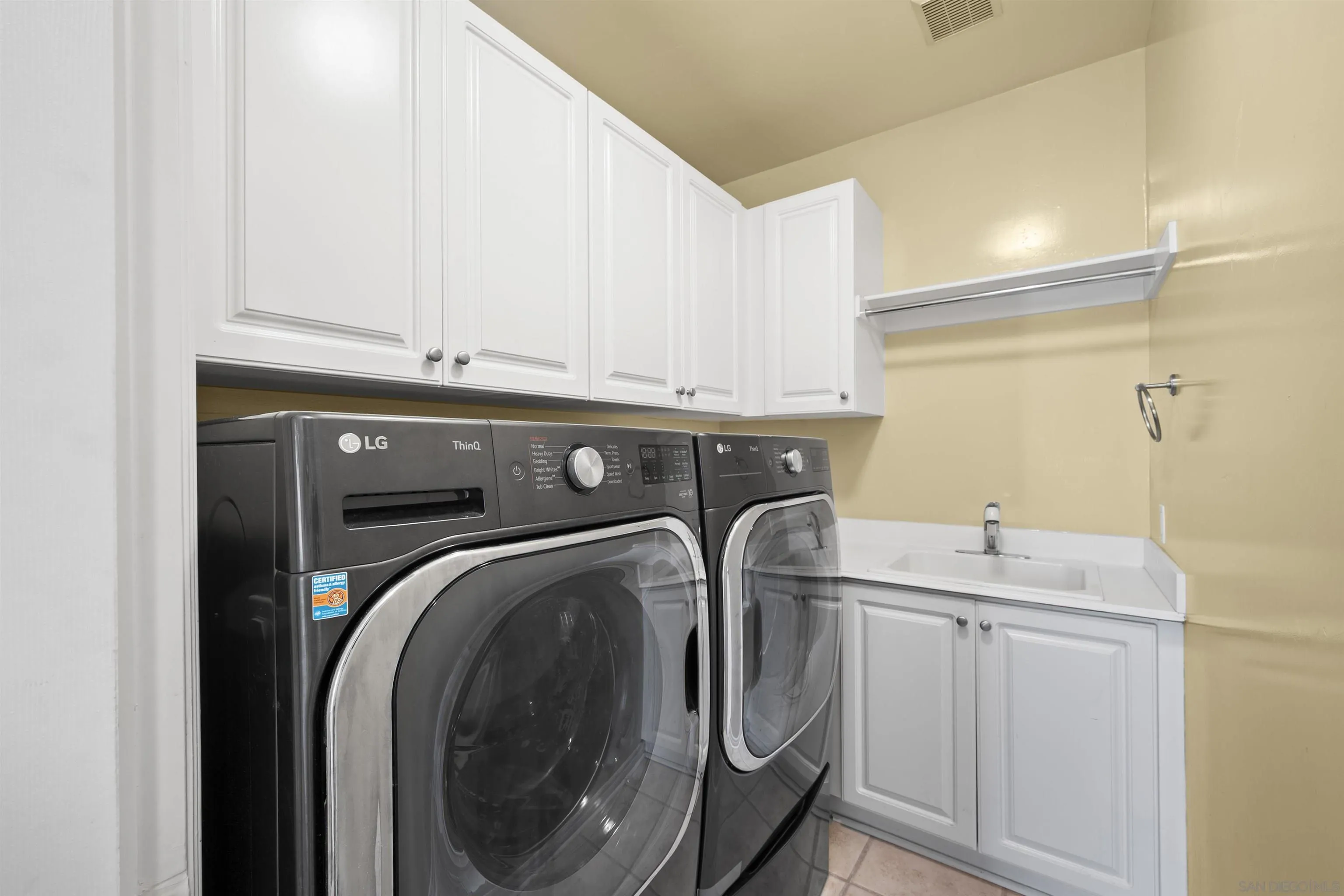 2873 West Bainbridge Road San Diego, CA 92106 - Photo 39 of 54 a utility room with dryer and washer