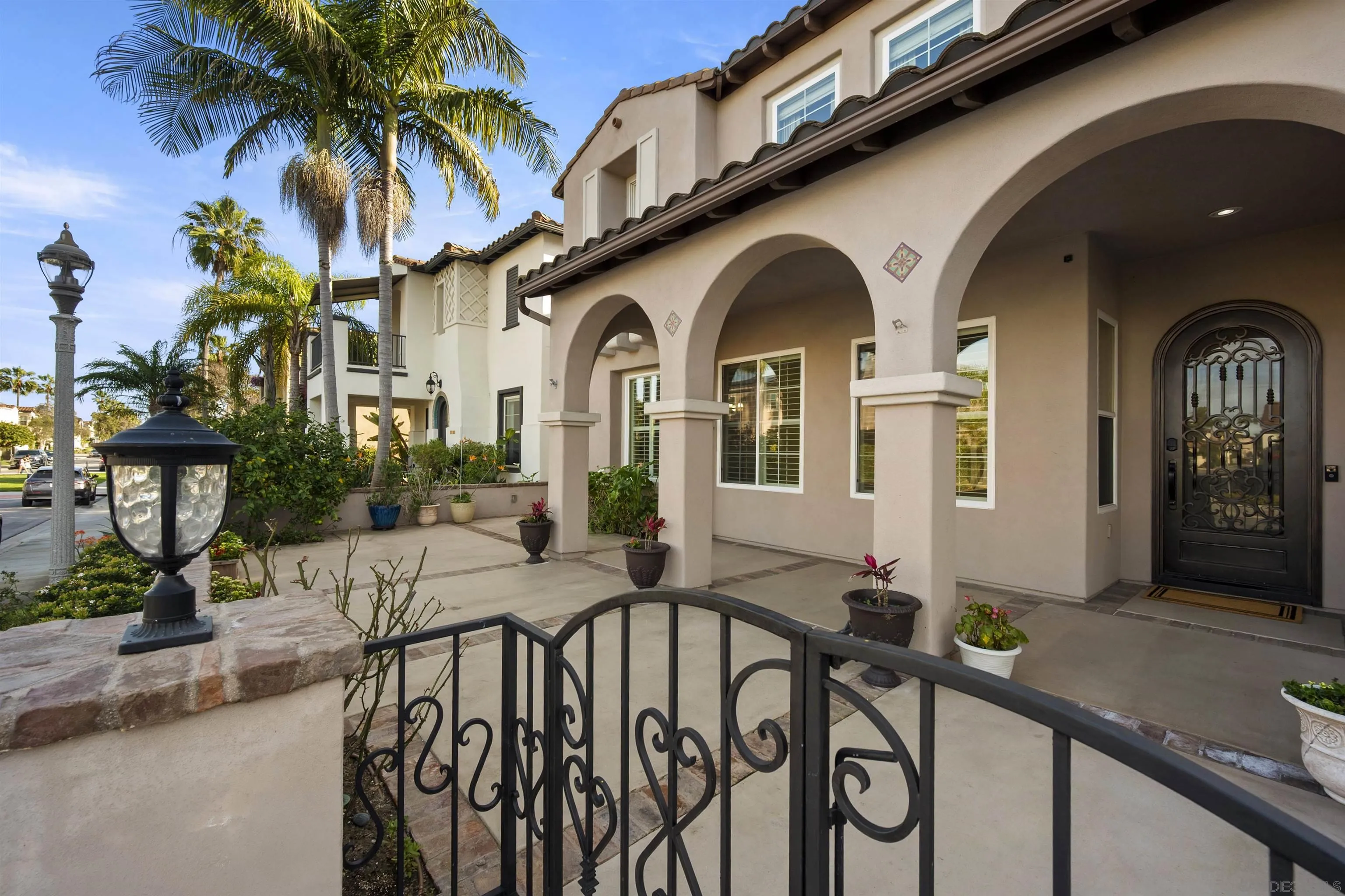 2873 West Bainbridge Road San Diego, CA 92106 - Photo 5 of 54 a front view of a house with garden