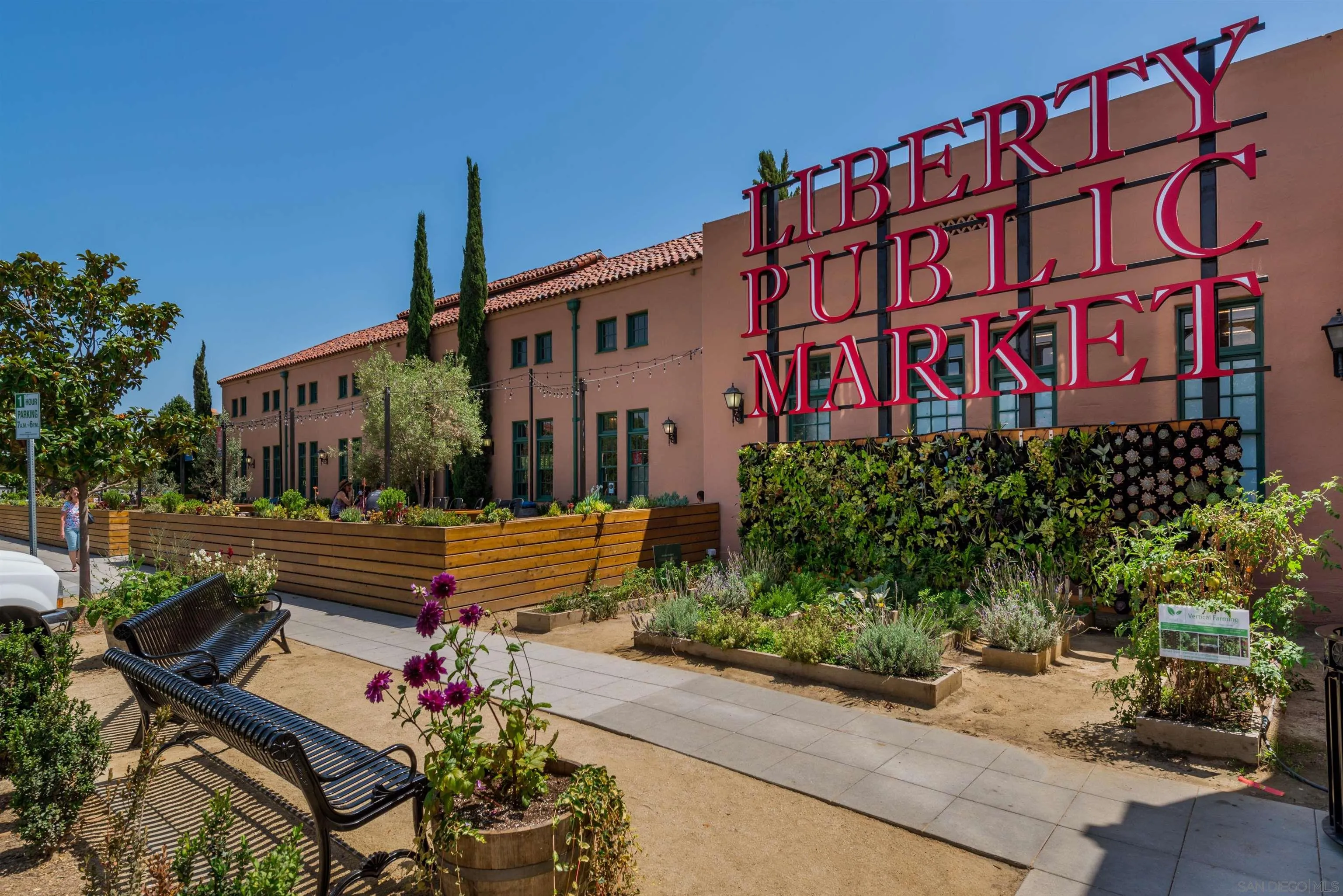 2873 West Bainbridge Road San Diego, CA 92106 - Photo 53 of 54 a front view of a building with flowers