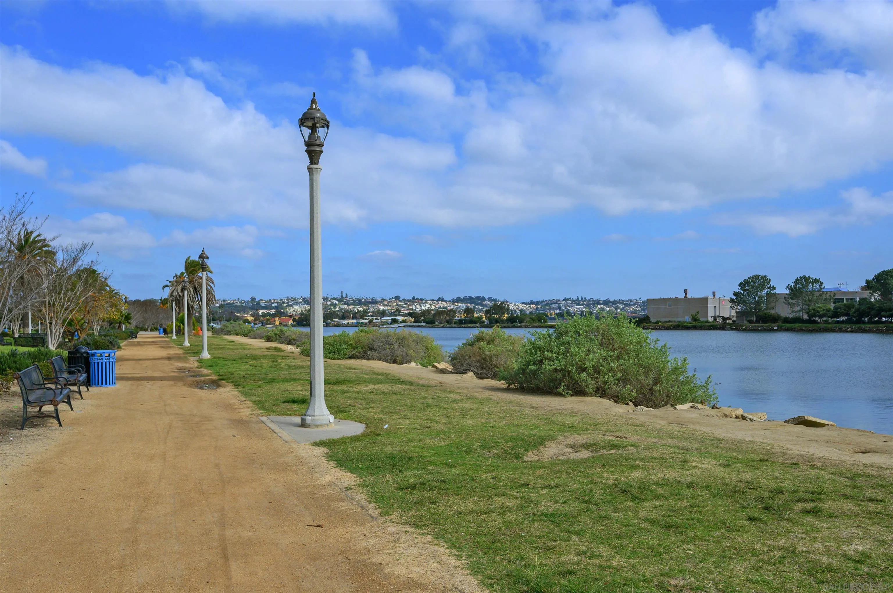 2873 West Bainbridge Road San Diego, CA 92106 - Photo 54 of 54 a view of a lake with a house in the background