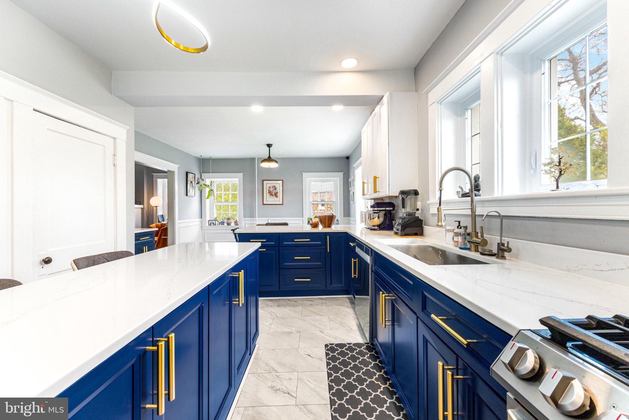 106 Edgewood Road Baltimore, MD 21286 - Photo 17 of 42 Modern kitchen with bold blue accents.