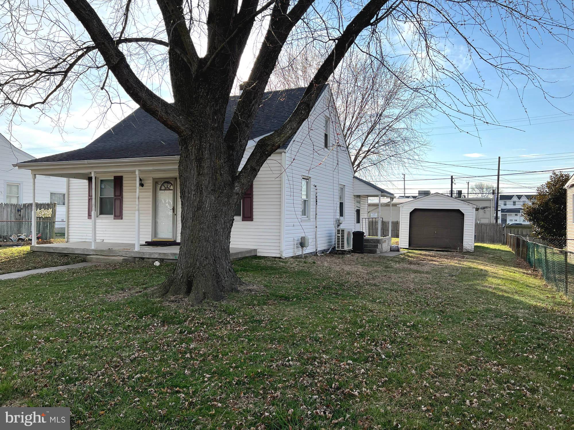 54 Riverside Road Baltimore, MD 21221 - Photo 2 of 14 a view of a house with a yard