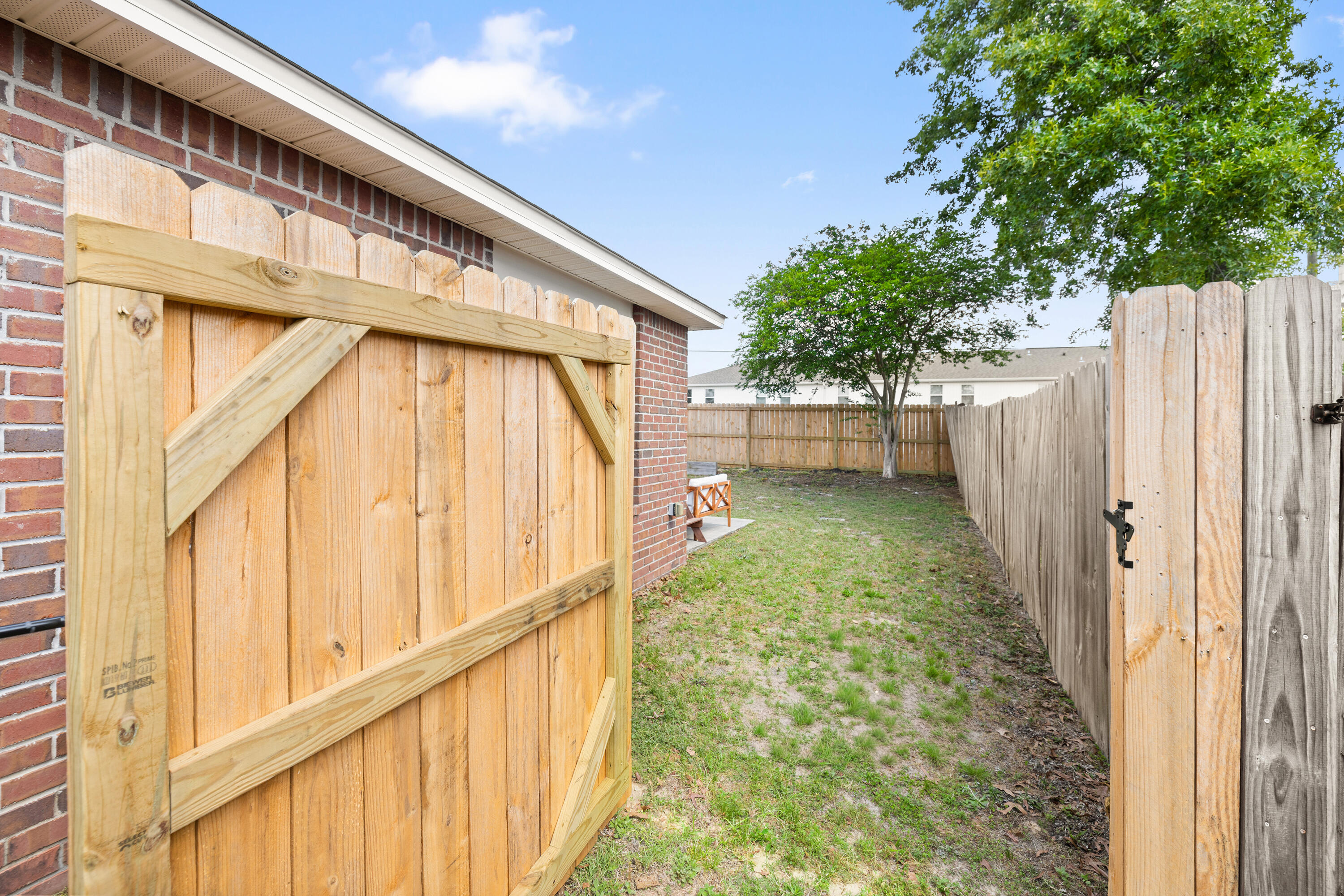202 Limestone Circle Crestview, FL 32539 - Photo 42 of 49 a view of yard with small space and wooden fence