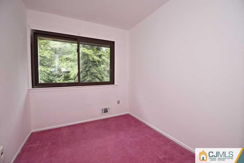 A9 Georges Road, Unit 9 Dayton, NJ 08810 - Photo 11 of 20 an empty room with a window