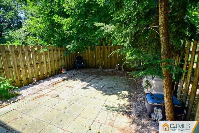 A9 Georges Road, Unit 9 Dayton, NJ 08810 - Photo 15 of 20 a pathway of a yard