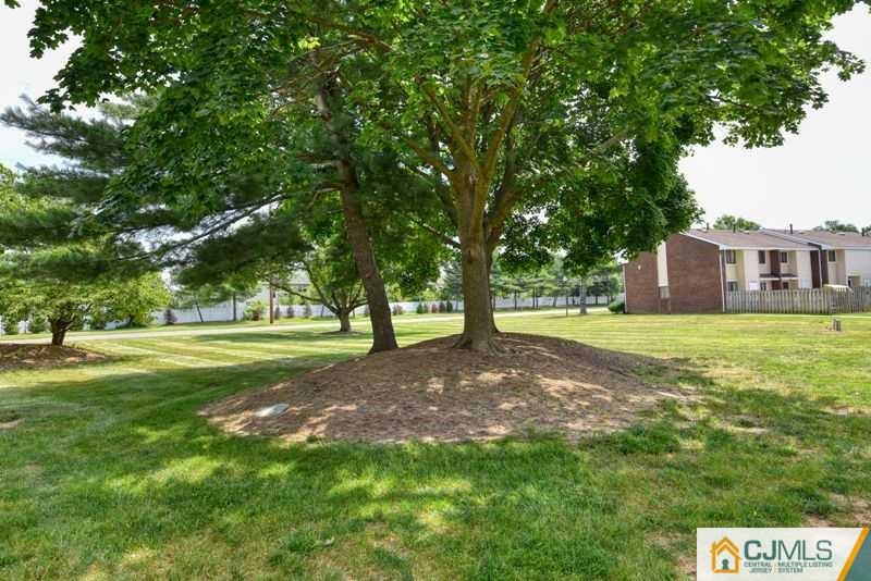 A9 Georges Road, Unit 9 Dayton, NJ 08810 - Photo 8 of 20 a view of a house with a yard