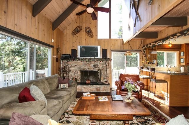 766 Crown Drive Lake Arrowhead, CA 92352 - Photo 2 of 2 a living room with furniture and a fireplace