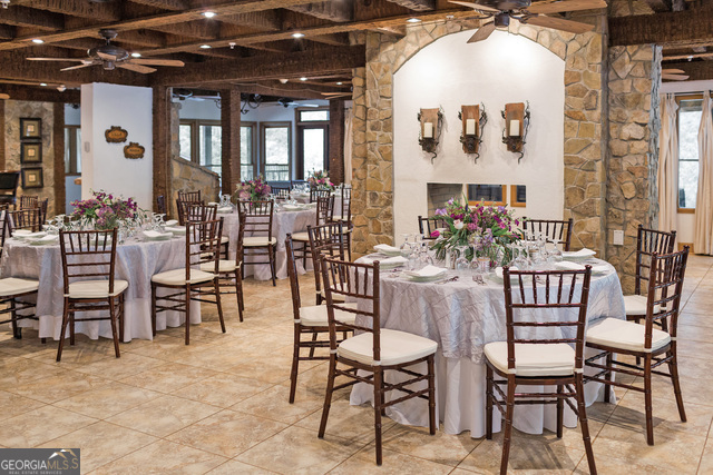 1760 Rickman Airfield Road Tiger, GA 30576 - Photo 13 of 38 a view of a dining room with furniture and chandelier