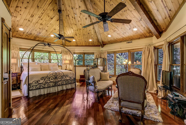 1760 Rickman Airfield Road Tiger, GA 30576 - Photo 14 of 38 a room with wooden floor and furniture