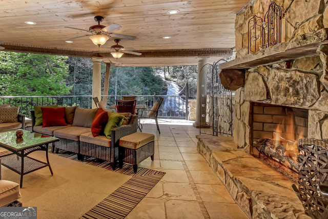 1760 Rickman Airfield Road Tiger, GA 30576 - Photo 15 of 38 a outdoor space with lots of tables and chairs