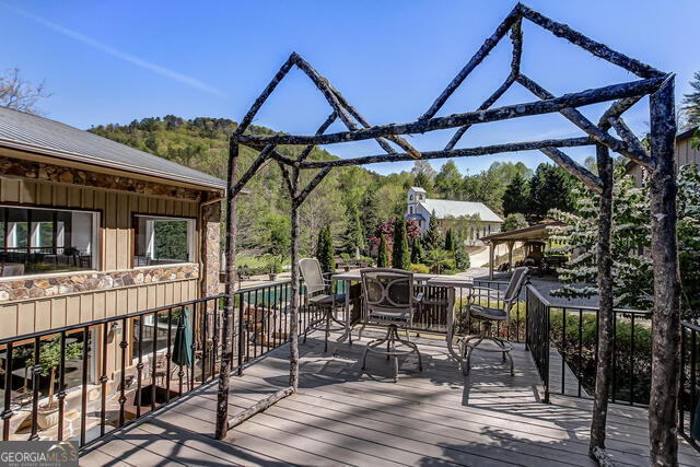 1760 Rickman Airfield Road Tiger, GA 30576 - Photo 19 of 38 a view of house with outdoor seating and city view