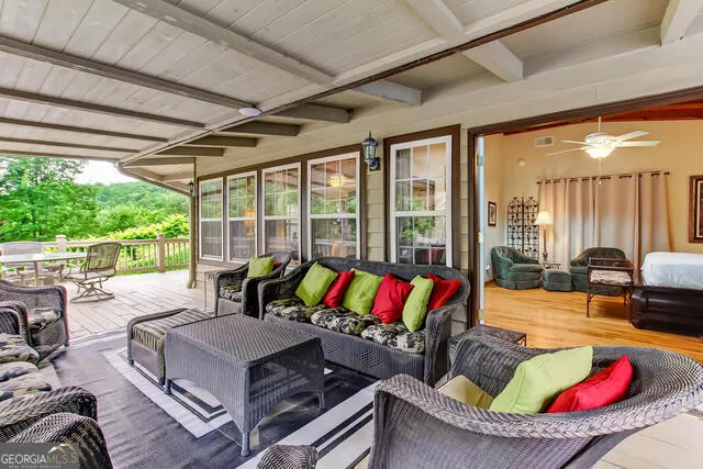 front view of a house with a bench