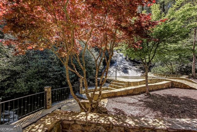 1760 Rickman Airfield Road Tiger, GA 30576 - Photo 10 of 38 a view of a yard with wooden fence