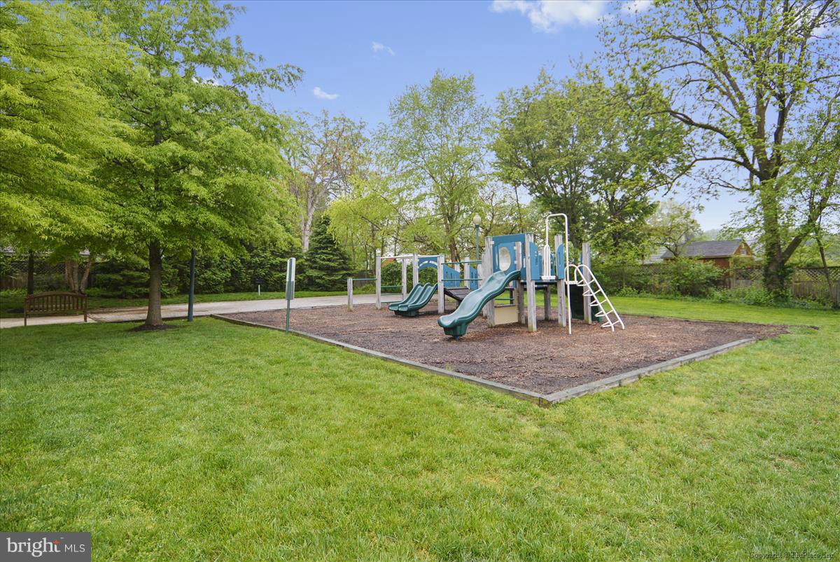 11344 King George Drive, Unit 5 Silver Spring, MD 20902 - Photo 4 of 30 a view of a park with swings