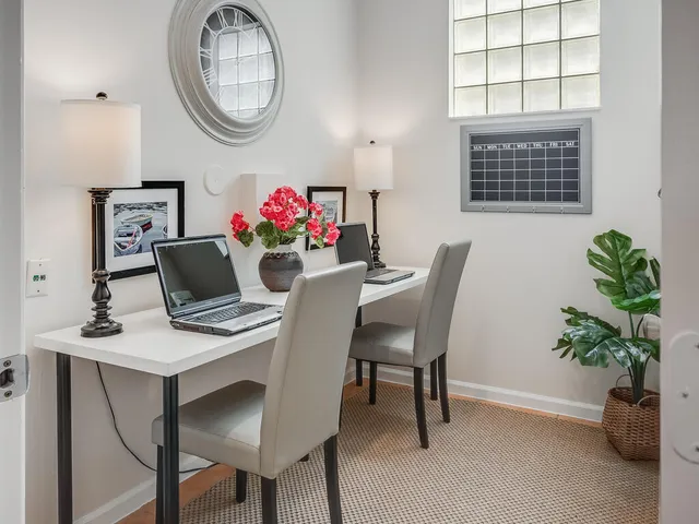 a outdoor space with lots of furniture and glass door