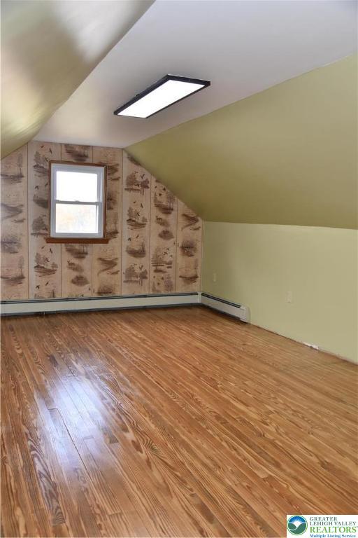 238 Grim Road Kutztown, PA 19530 - Photo 17 of 27 an empty room with wooden floor and windows