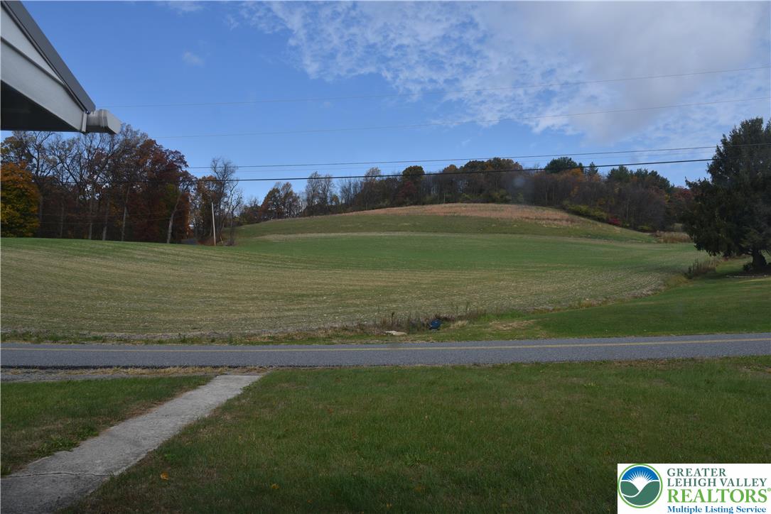 238 Grim Road Kutztown, PA 19530 - Photo 19 of 27 a view of a field with grass and trees
