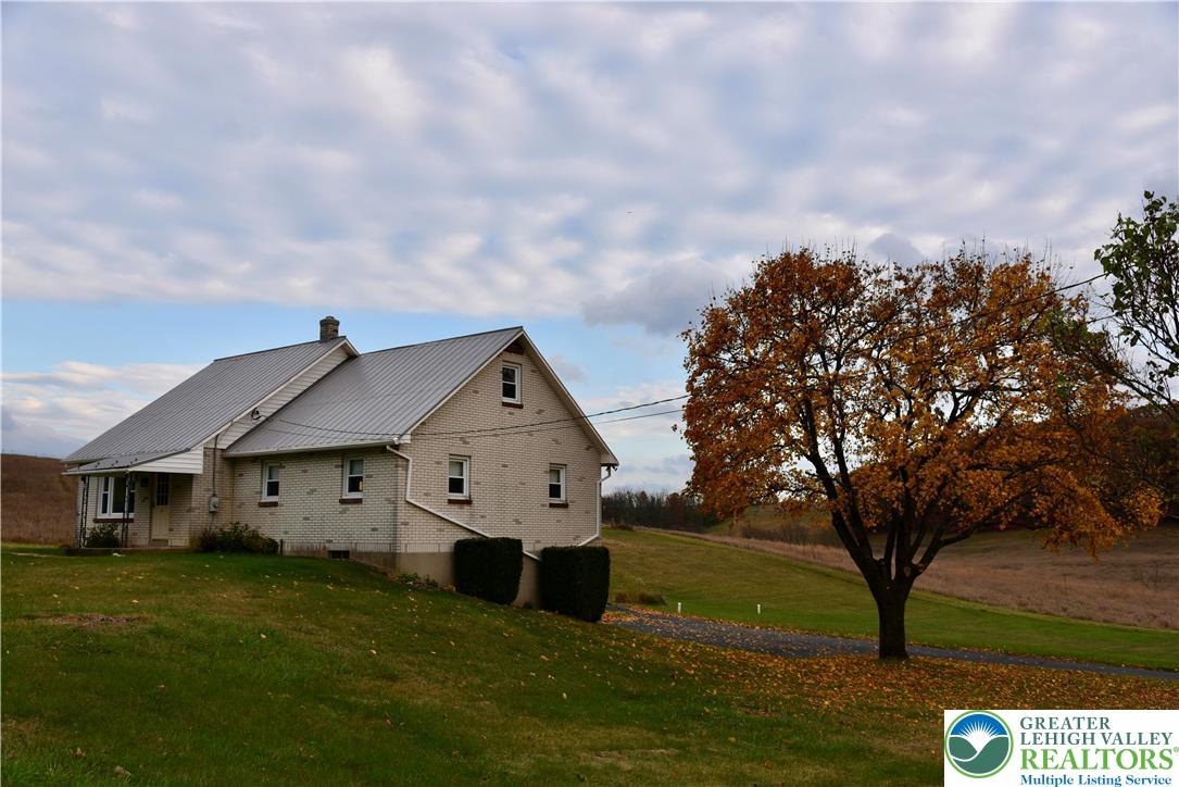 238 Grim Road Kutztown, PA 19530 - Photo 27 of 27 a front view of a house with garden