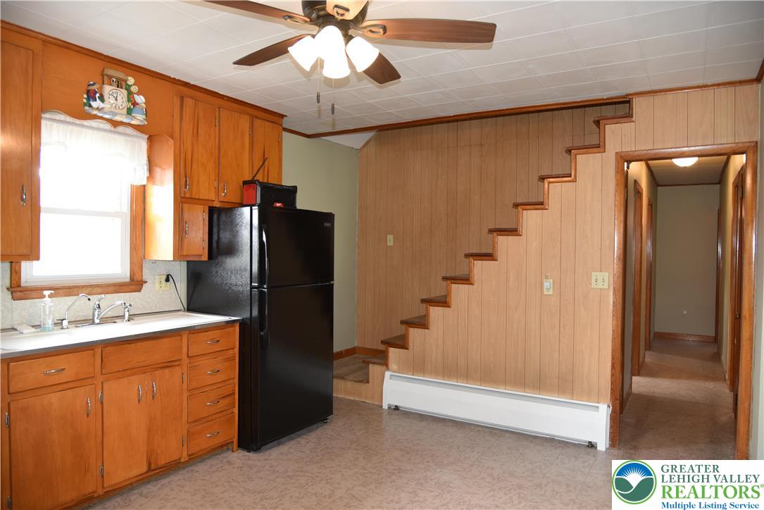 238 Grim Road Kutztown, PA 19530 - Photo 4 of 27 a bathroom with a sink a mirror and a shower