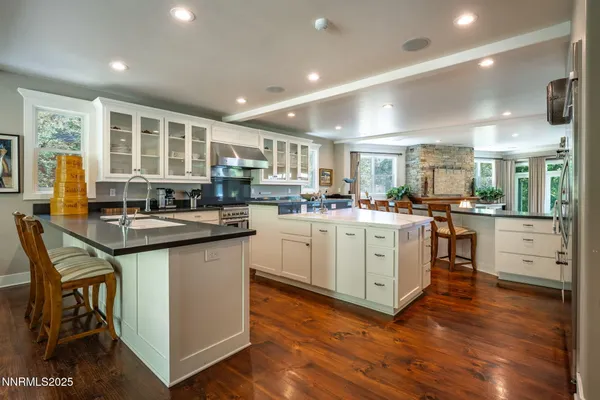 a kitchen with counter top space and appliances