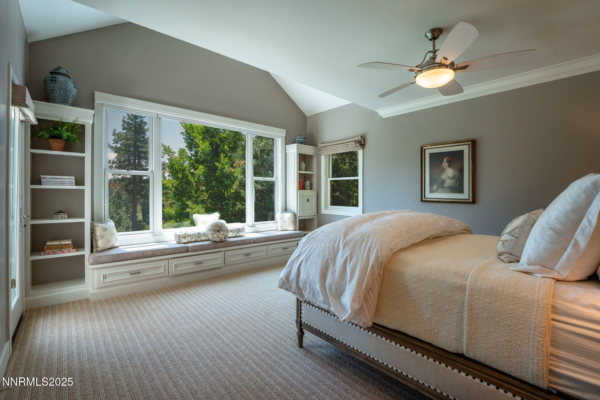 1964 Glenbrook House Road Glenbrook, NV 89413 - Photo 20 of 42 a bed room with a bed and a large window