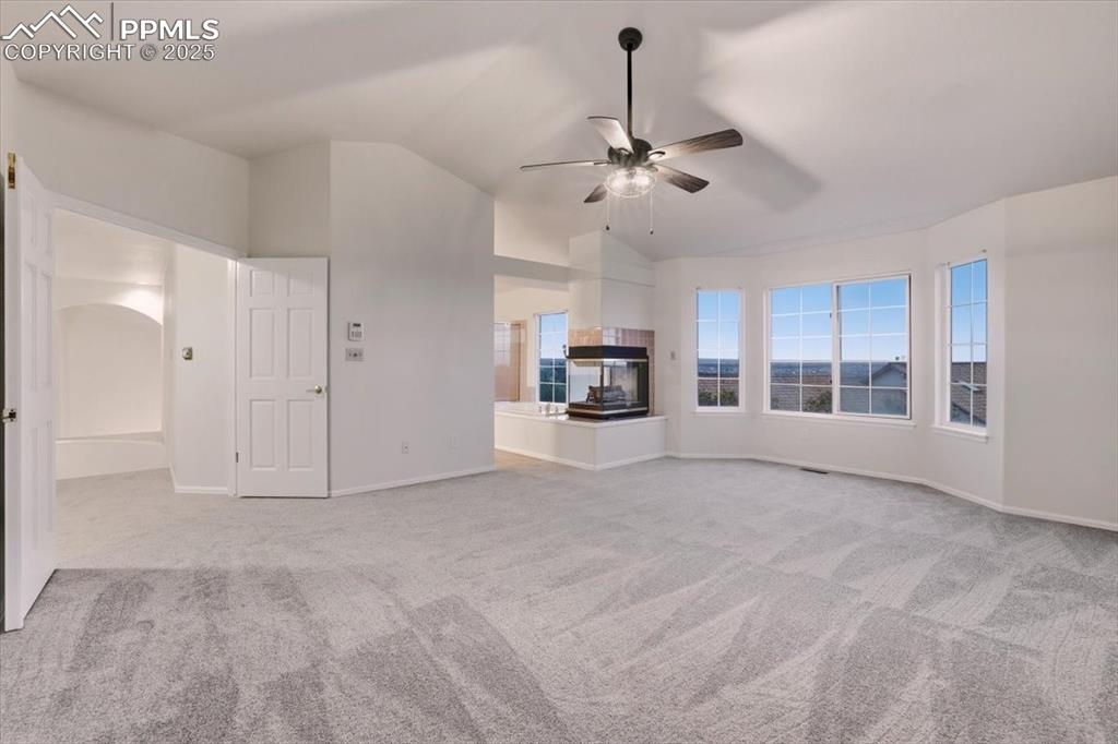 395 Cardiff Circle Colorado Springs, CO 80906 - Photo 17 of 31 a view of an empty room with a window