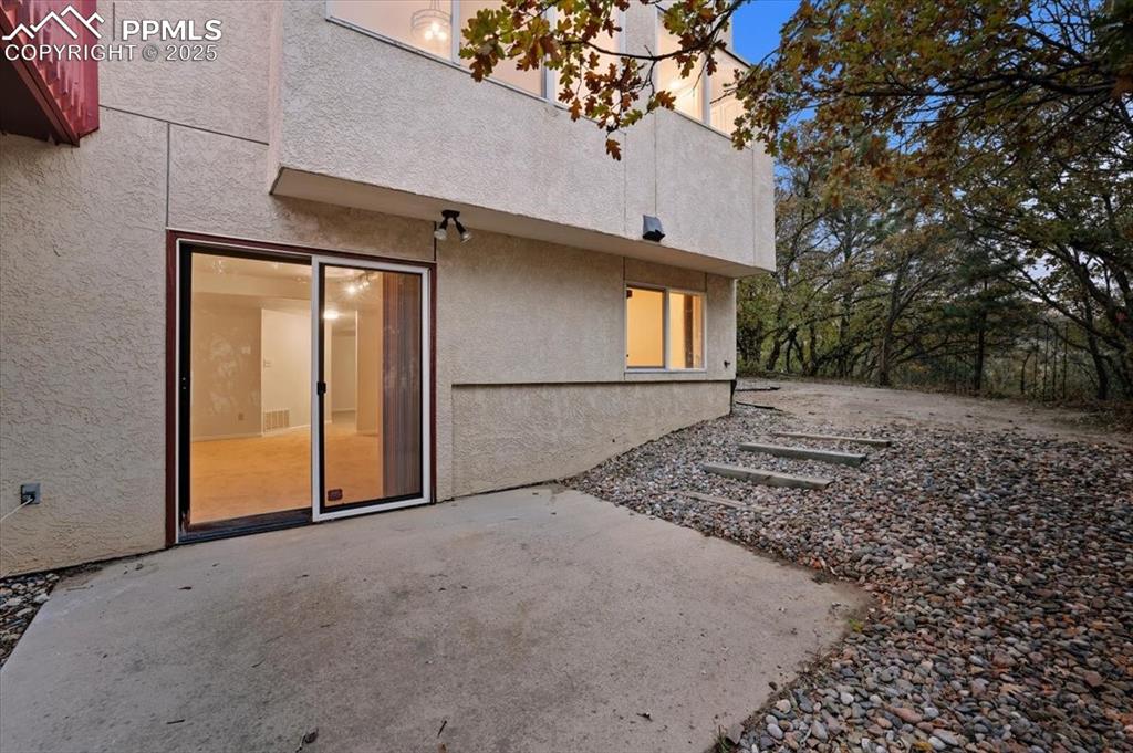 395 Cardiff Circle Colorado Springs, CO 80906 - Photo 29 of 31 a view of a house with a yard and garage