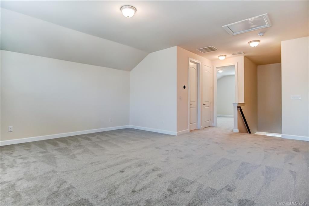 1263 Independence Street, Unit 80 Tega Cay, SC 29708 - Photo 22 of 34 a view of an empty room