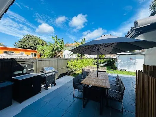an aerial view of a house with swimming pool