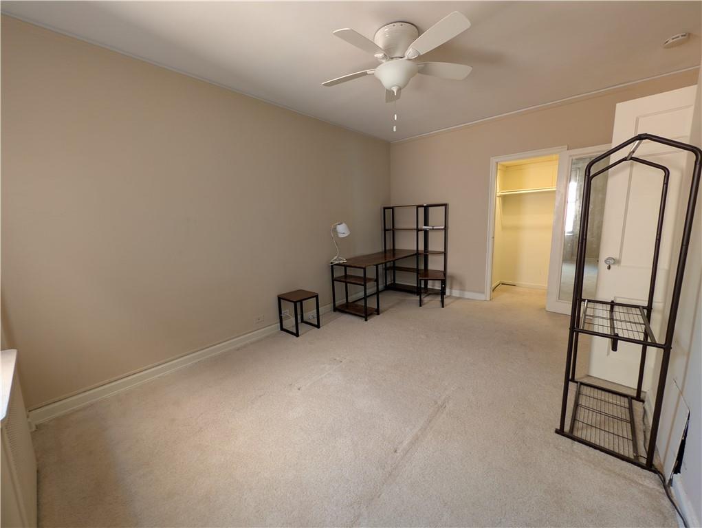 144 North Dithridge Street, Unit 403 Pittsburgh, PA 15213 - Photo 18 of 31 an empty room with windows
