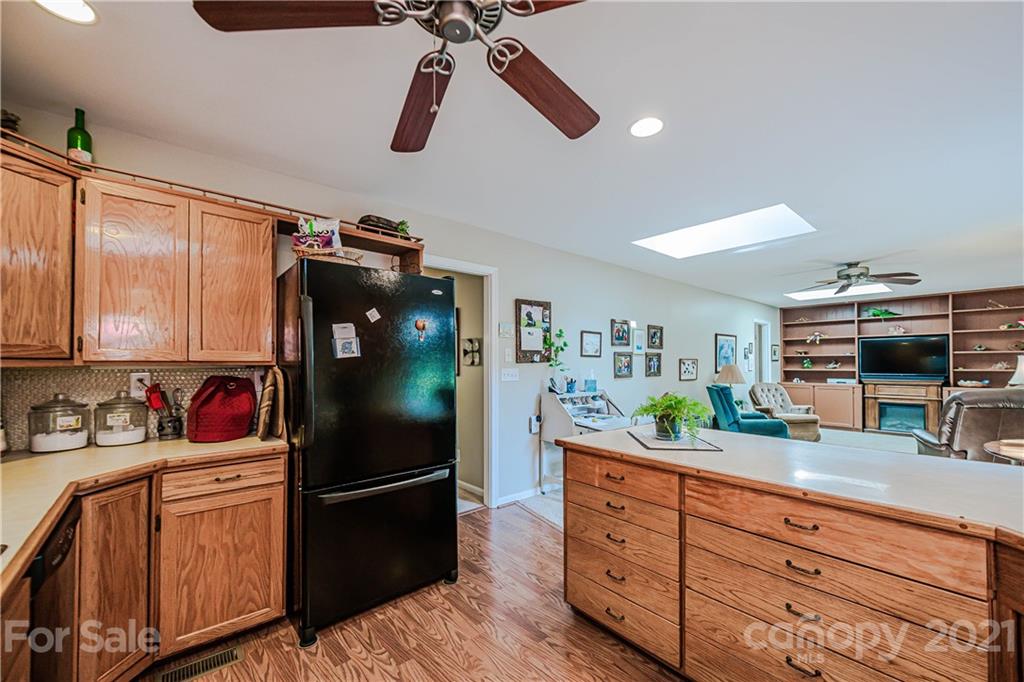 23055 Point Clear Drive, Unit 5 Tega Cay, SC 29708 - Photo 17 of 45 a kitchen with stainless steel appliances a refrigerator and a sink