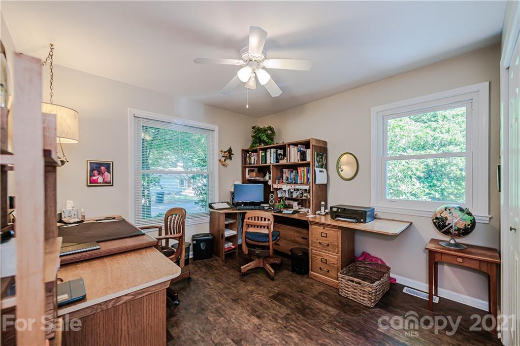 23055 Point Clear Drive, Unit 5 Tega Cay, SC 29708 - Photo 26 of 45 a room with furniture a rug and a window
