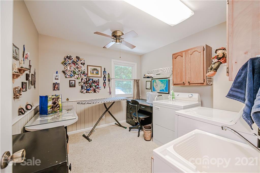 23055 Point Clear Drive, Unit 5 Tega Cay, SC 29708 - Photo 28 of 45 a view of a workspace with furniture and a window