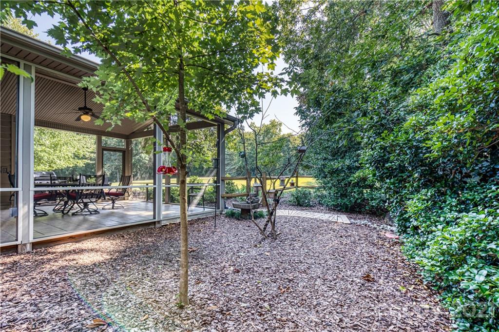 23055 Point Clear Drive, Unit 5 Tega Cay, SC 29708 - Photo 36 of 45 a view of a park with a tree