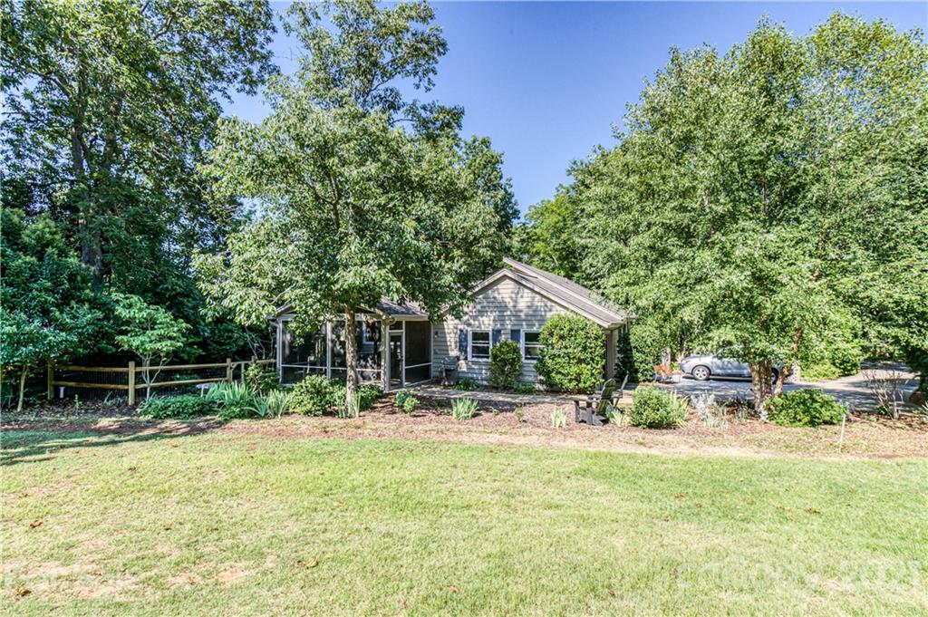 23055 Point Clear Drive, Unit 5 Tega Cay, SC 29708 - Photo 39 of 45 a front view of a house with a yard