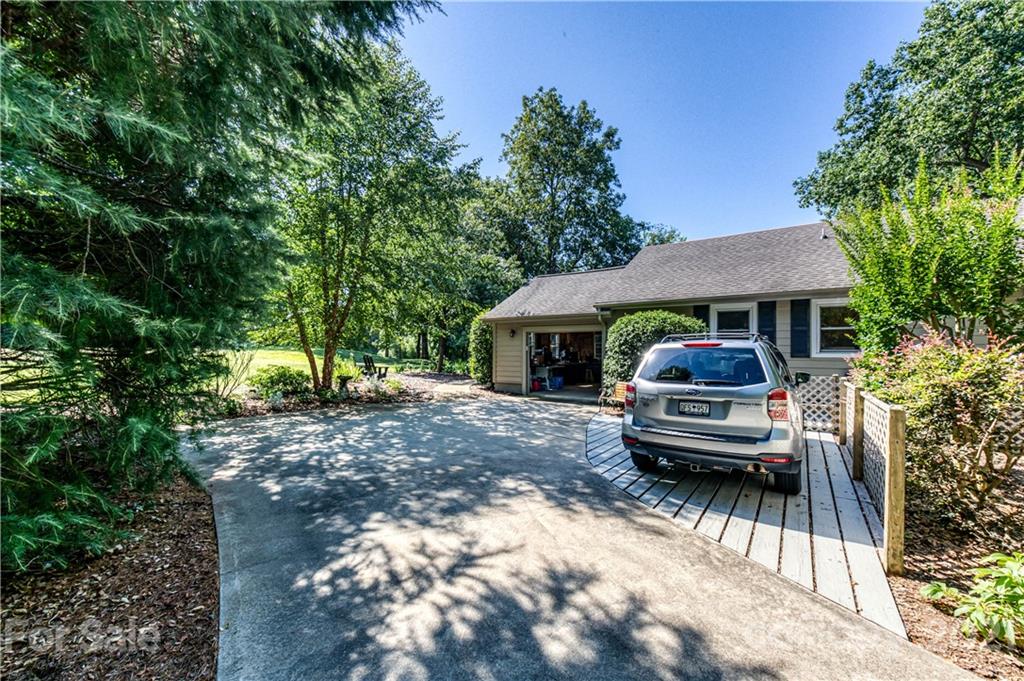 23055 Point Clear Drive, Unit 5 Tega Cay, SC 29708 - Photo 40 of 45 a house view with a sitting space and garden