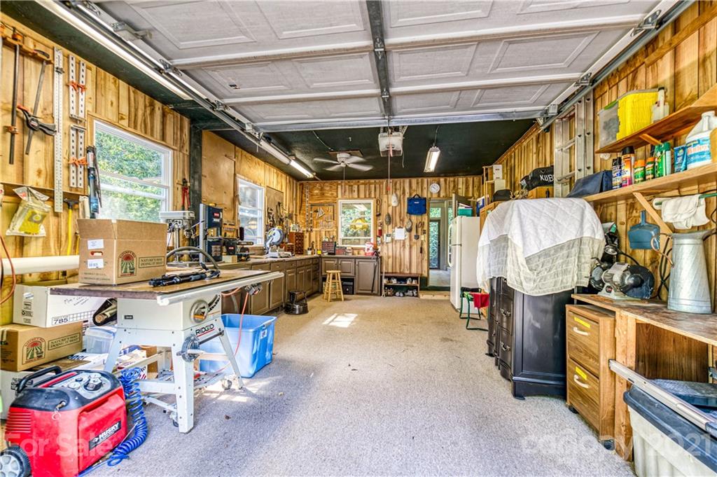 23055 Point Clear Drive, Unit 5 Tega Cay, SC 29708 - Photo 41 of 45 a view of a garage with stuff