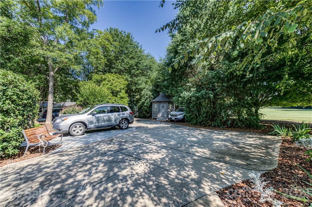 23055 Point Clear Drive, Unit 5 Tega Cay, SC 29708 - Photo 43 of 45 a view of a car parked in front of a house