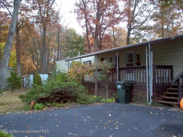 113 Village Road Morganville, NJ 07751 - Photo 1 of 7 a view of a house with a yard