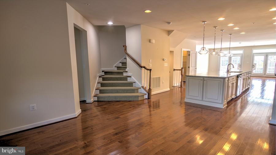 7652 Telamon Way Hanover, MD 21076 - Photo 15 of 34 a view of entryway with wooden floor